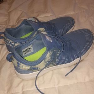 Women’s 9 Brand new blue NIKE running shoes